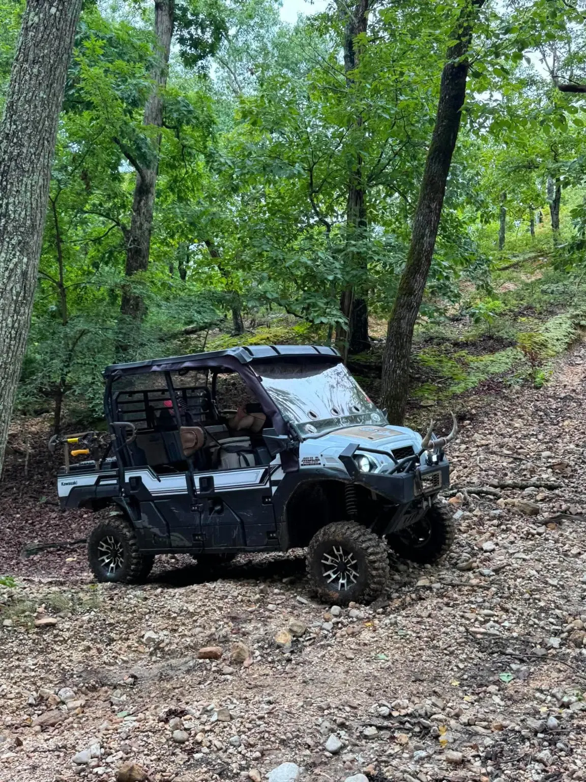 Justin Lafollette's 2024 Kawasaki Mule PRO-FXT 1000 Platinum Ranch Edition on rocky wooded terrain